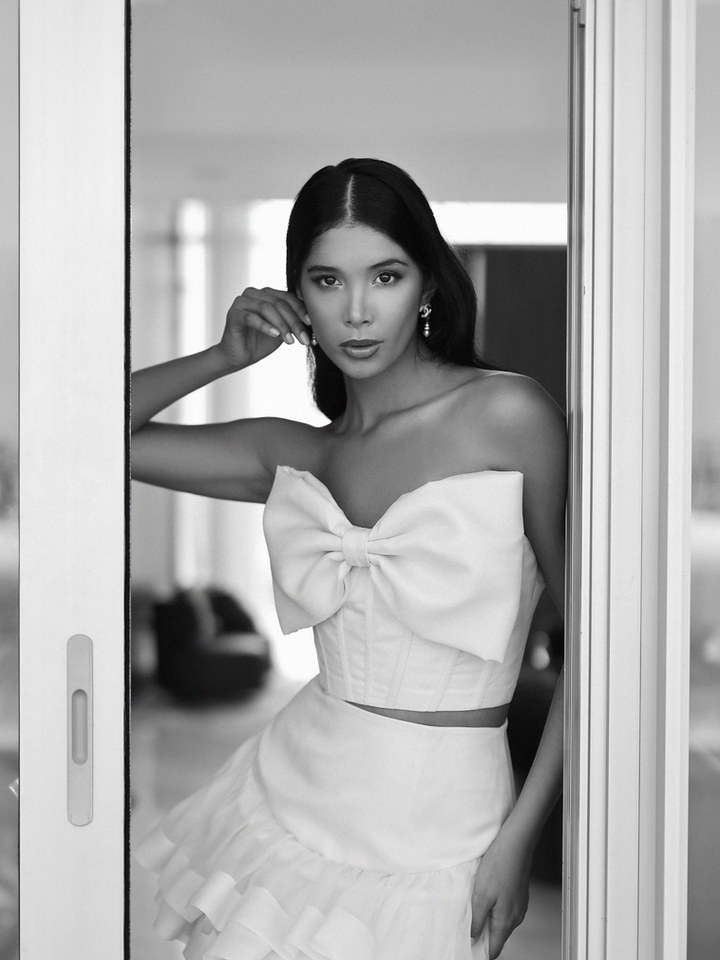 Archived plate No. 003, Edition 08 — white bow corset top with ruffle mini skirt, Haniye